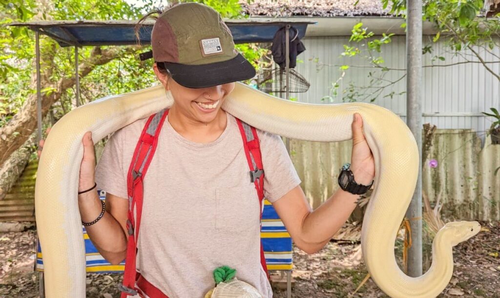 Snake handling on 1-Day Mekong Tour.