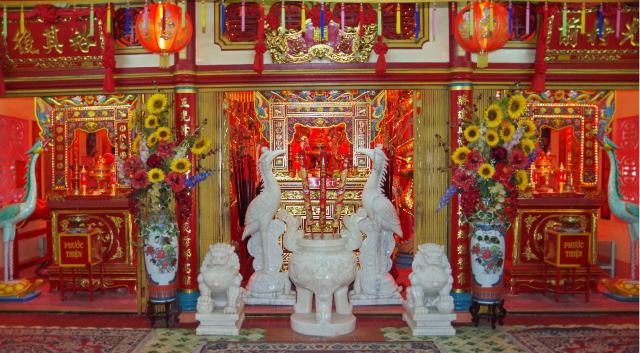 Altar with statues in Vung Tau's whale temple