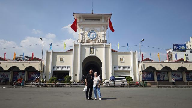 Tour guests outside Ben Thanh Market in HCMC