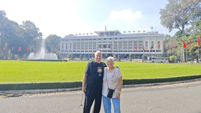 Tour guests outside Saigon's Independence Palace
